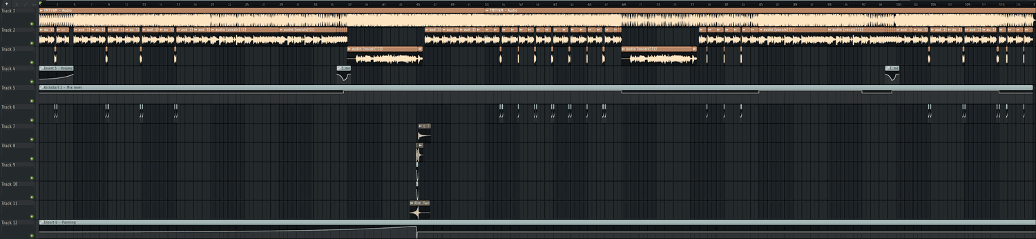 A full routine edit in the DAW: twelve tracks of vocals, chops, risers and automation across 115 bars.
